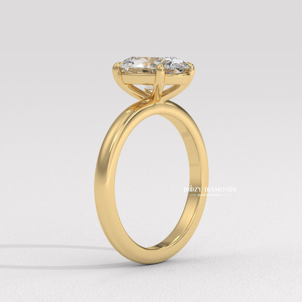 Oval cut diamond ring worn on hand