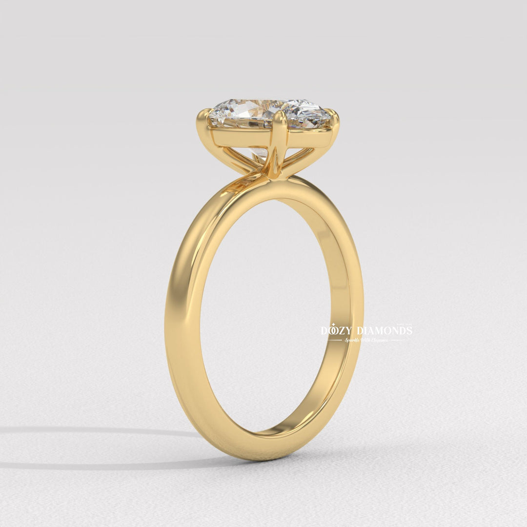 Oval cut diamond ring worn on hand