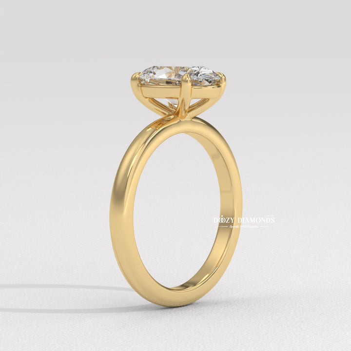 Oval cut diamond ring worn on hand