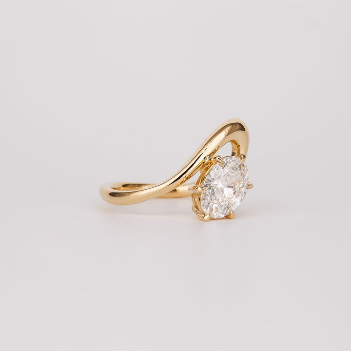 IGI certified oval cut diamond in solitaire engagement ring setting