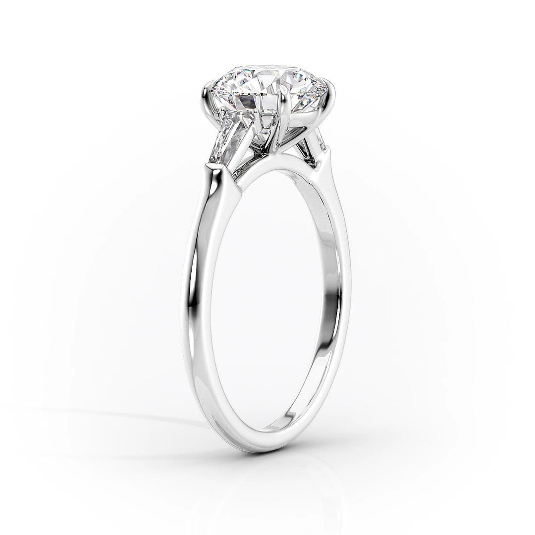 Top-down view of oval cut three stone engagement ring