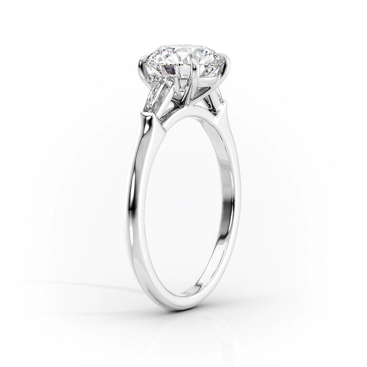 Top-down view of oval cut three stone engagement ring