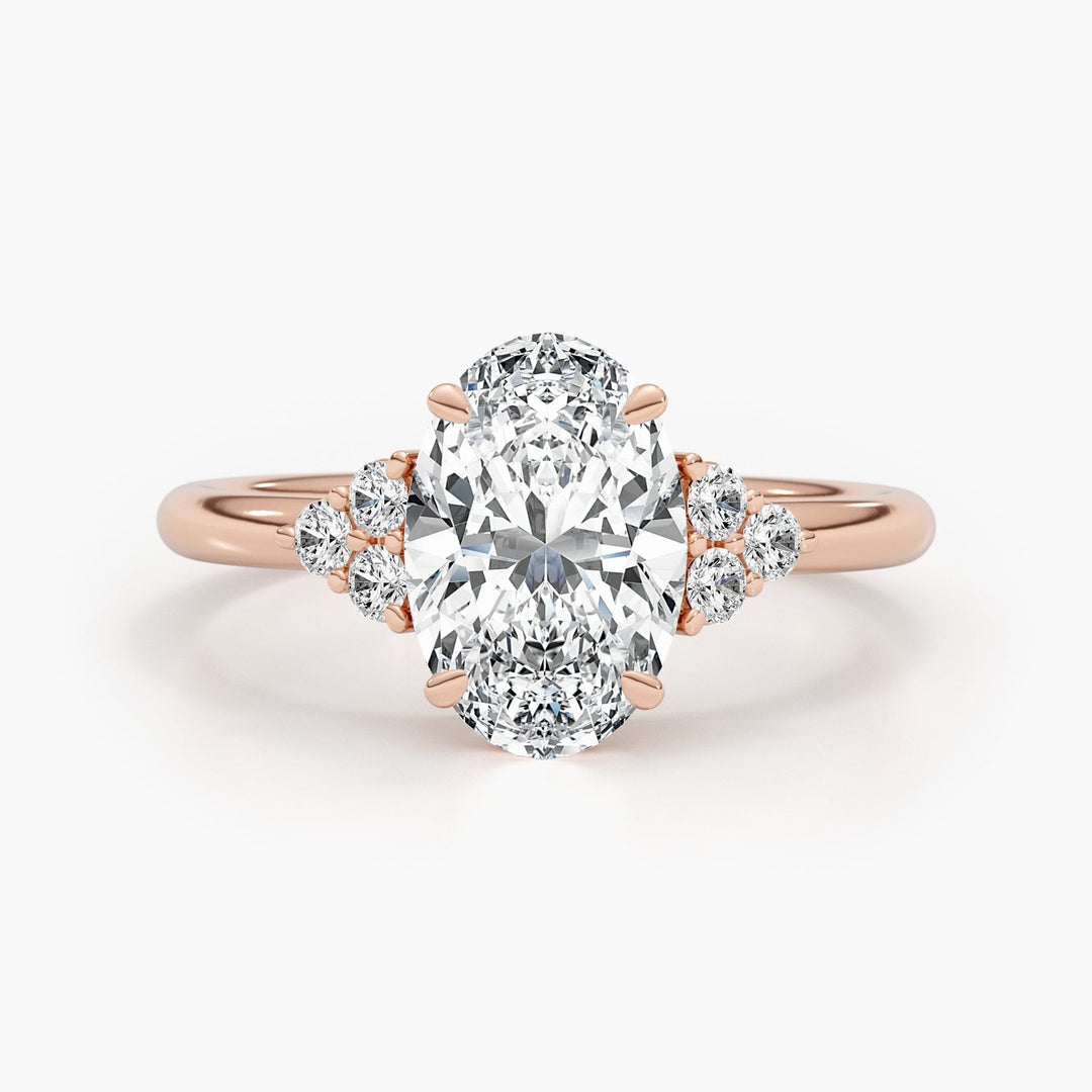 Detailed close-up of oval cluster diamond engagement ring