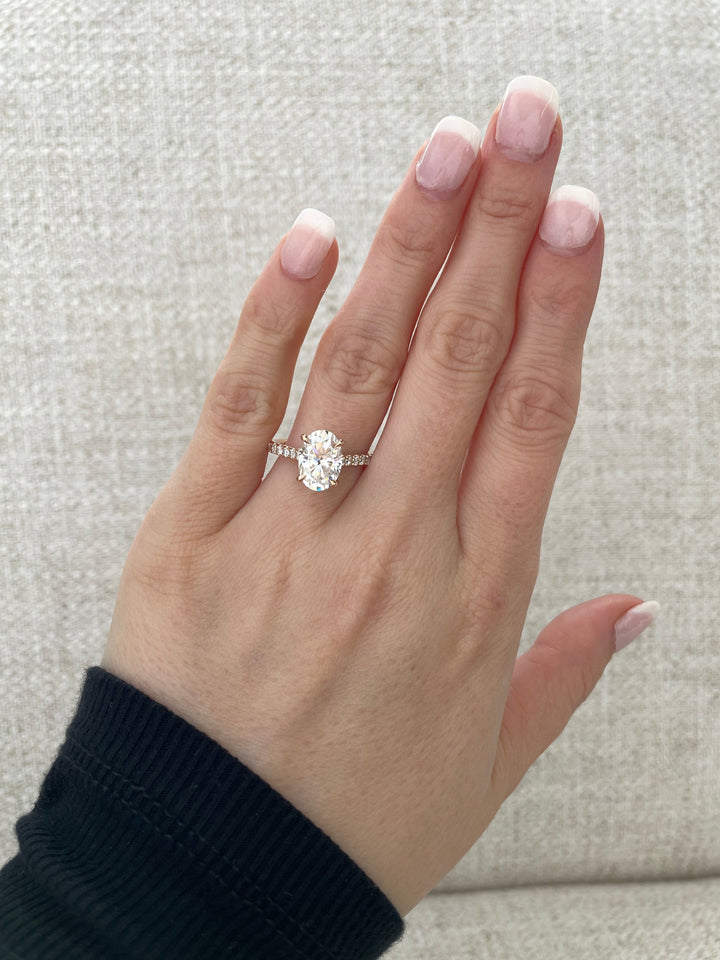 engagement ring for her, diamond engagement ring women, elegant diamond ring, sparkling engagement ring, fine jewelry engagement ring, oval brilliant diamond ring, lab created diamond ring, conflict free diamond ring, eco friendly engagement ring, hidden halo oval ring, pave band diamond ring, solitaire oval engagement ring, minimalist engagement ring, classic engagement ring style,