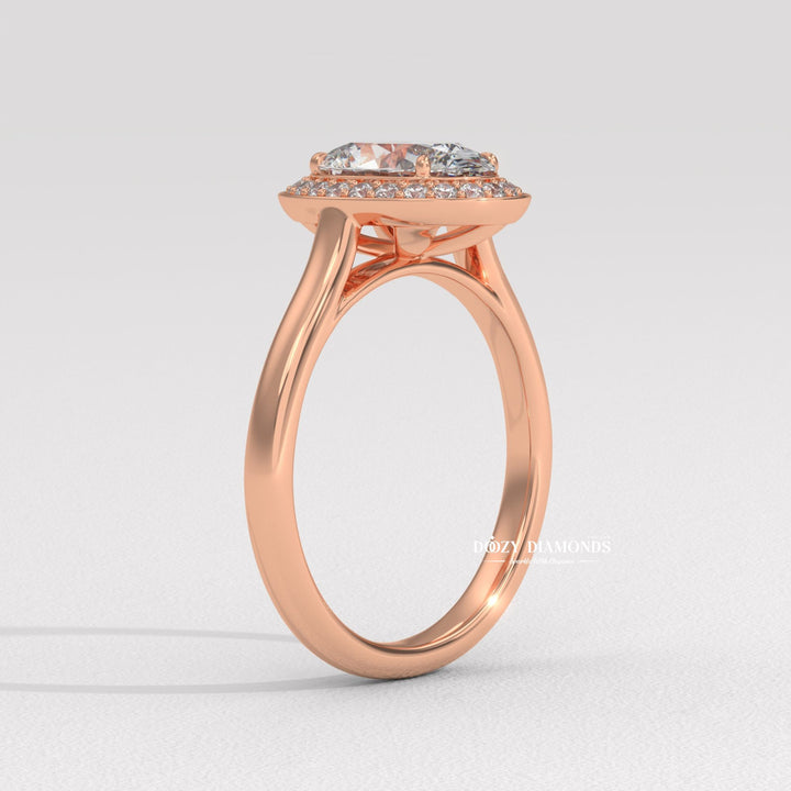 Oval solitaire diamond engagement ring available in multiple metals