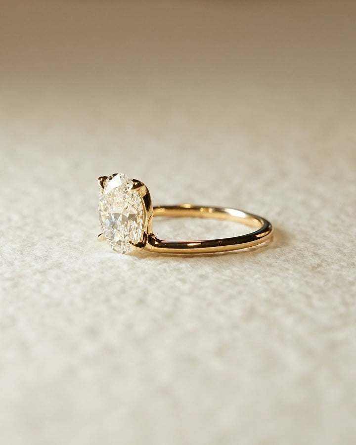 Oval cut engagement ring side view showing band detail