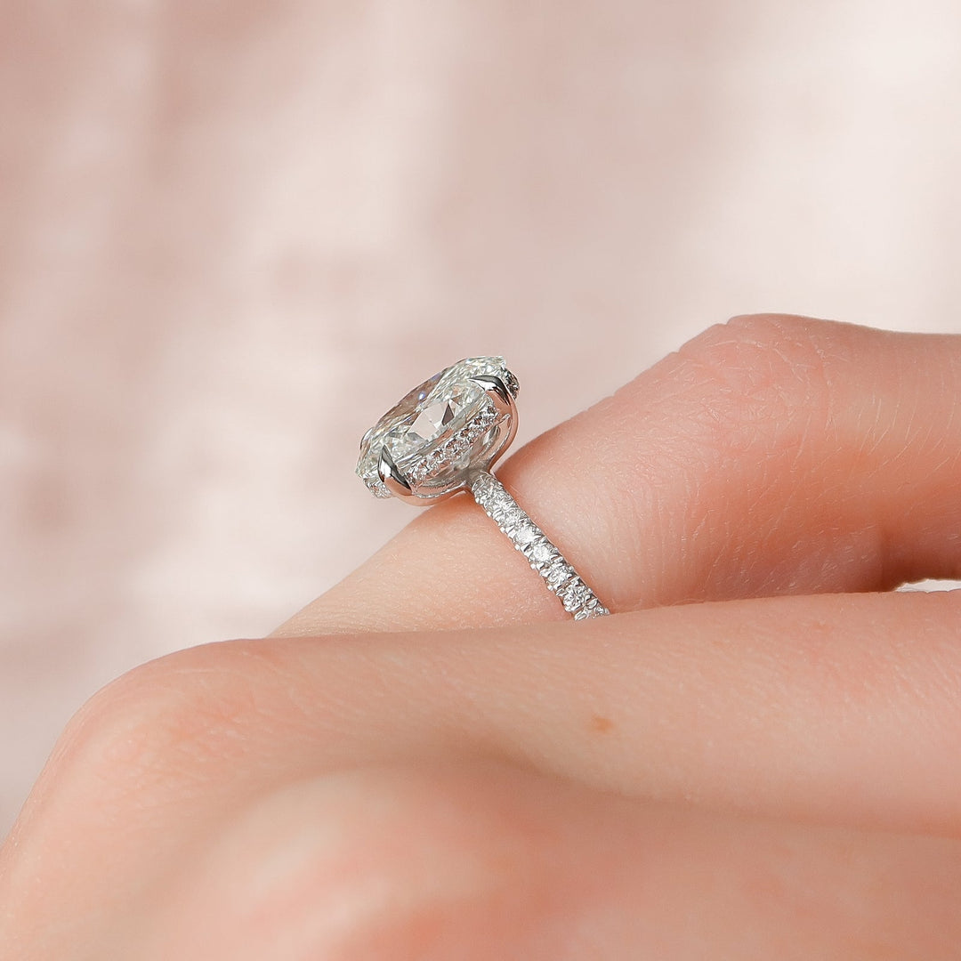 Oval cut engagement ring side view showing band detail