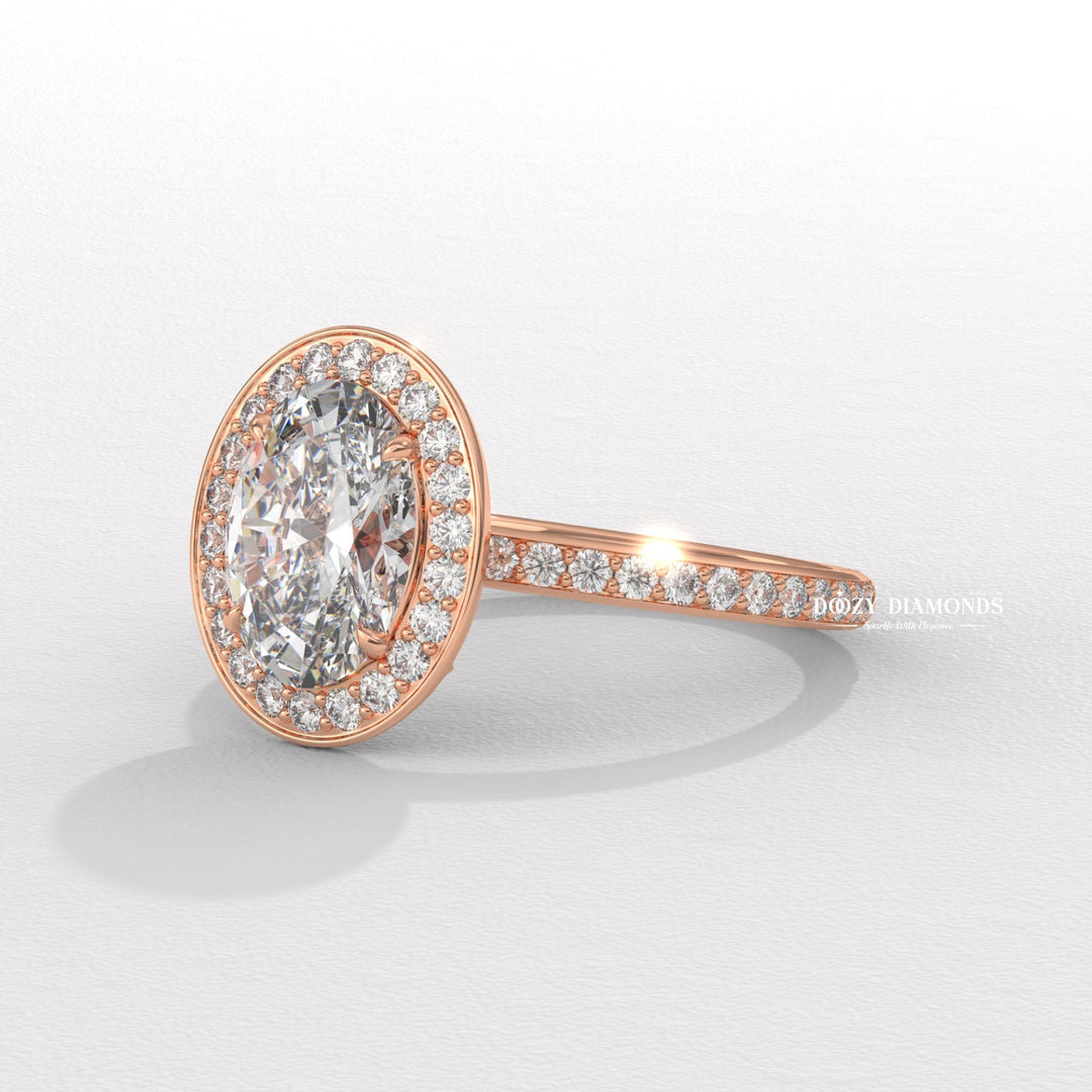 Oval halo engagement ring offered in gold and platinum