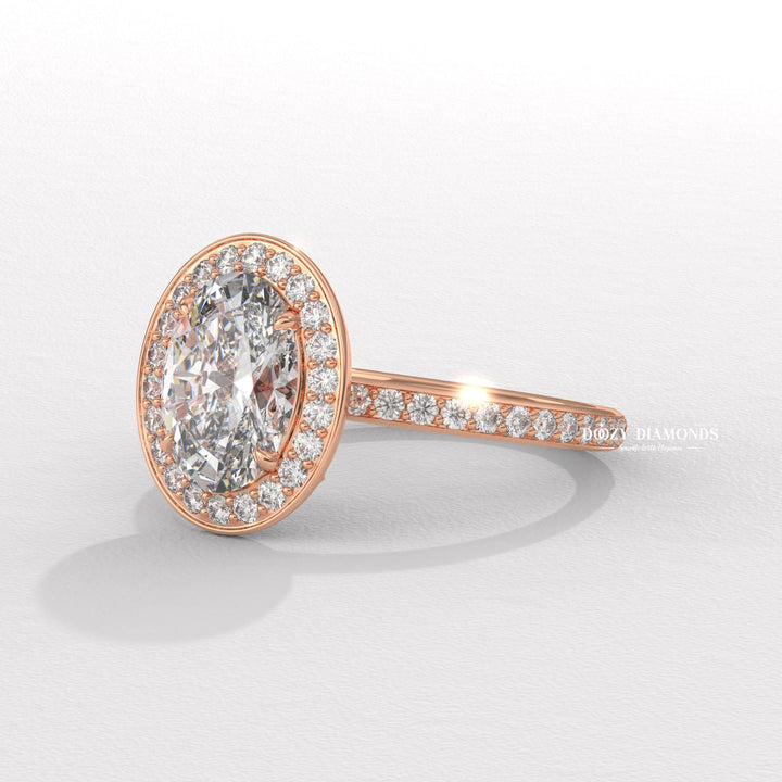 Oval halo engagement ring offered in gold and platinum