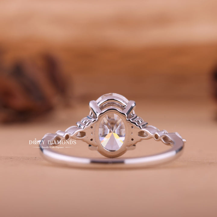 Certified oval cut diamond featured in cluster engagement ring