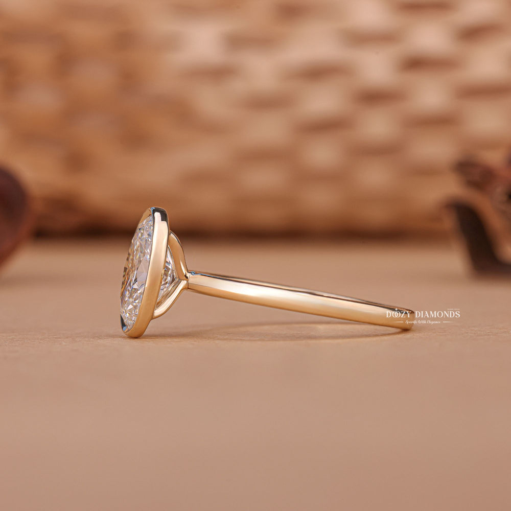 Oval bezel lab grown diamond ring in jewelry gift box