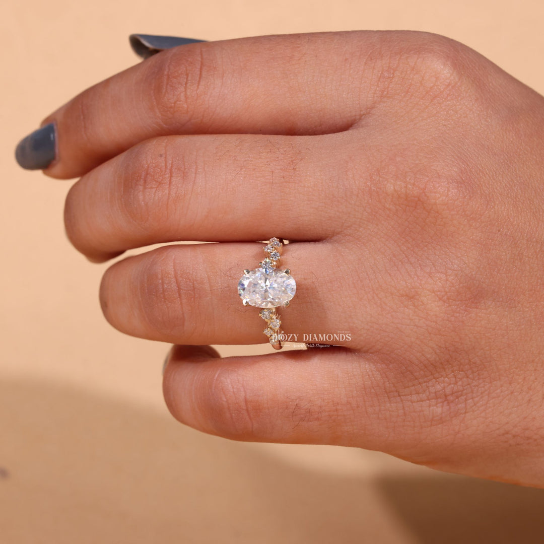 Top-down view of oval cut pave engagement ring