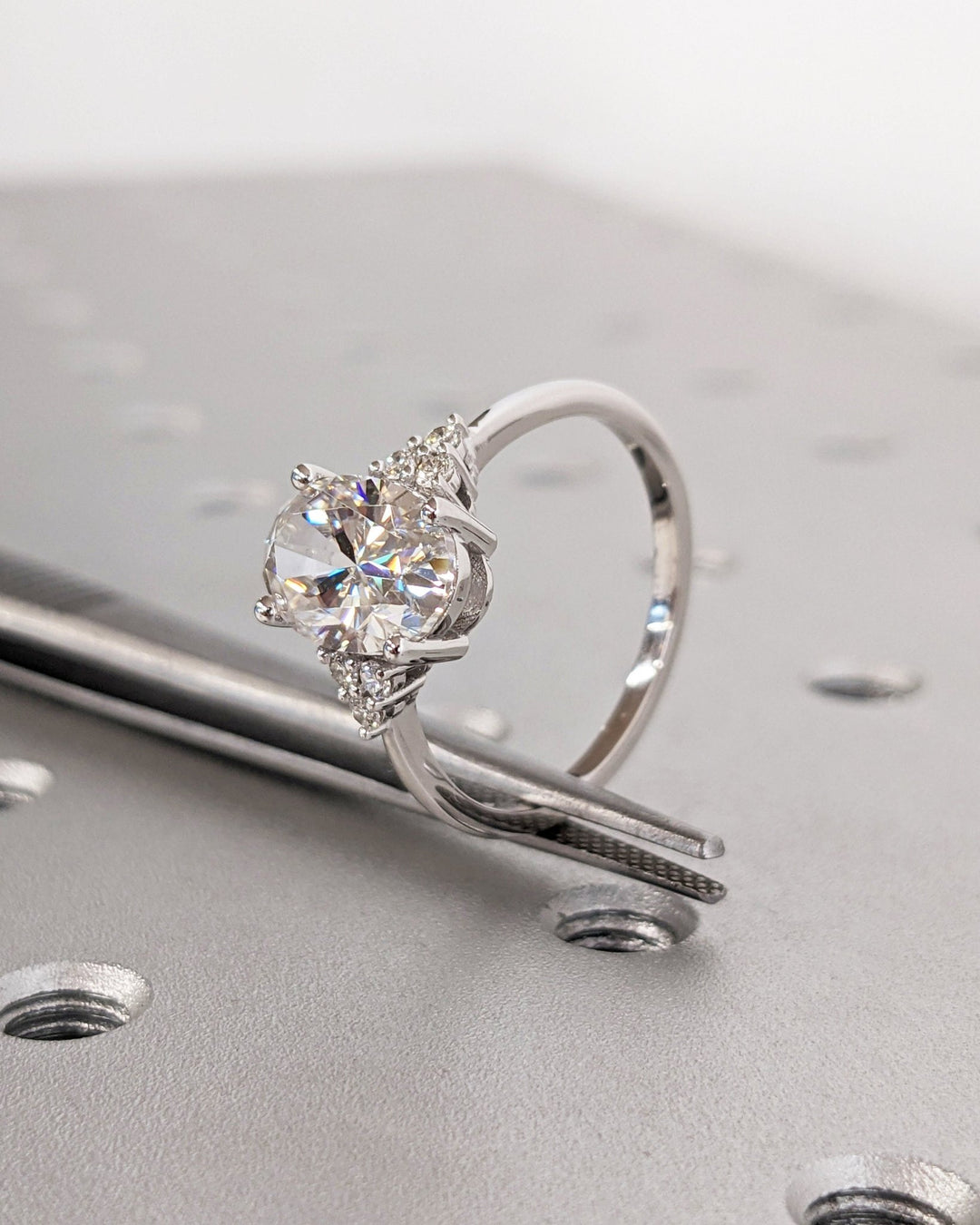 Oval cluster lab grown diamond ring side profile in gold setting
