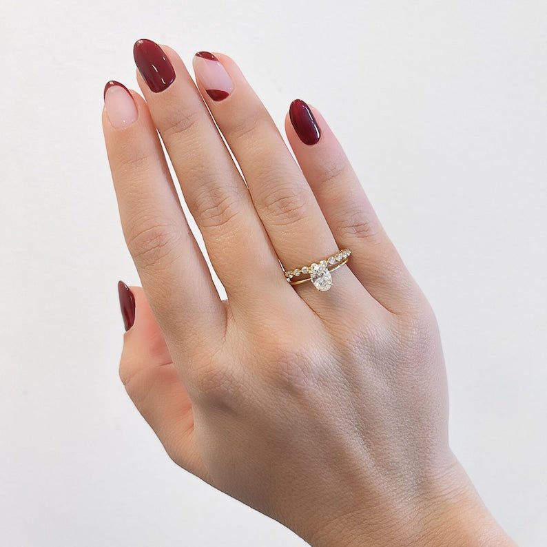 Oval cut engagement ring side view showing band detail