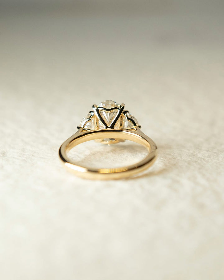 Classic oval three stone engagement ring crafted for everyday wear