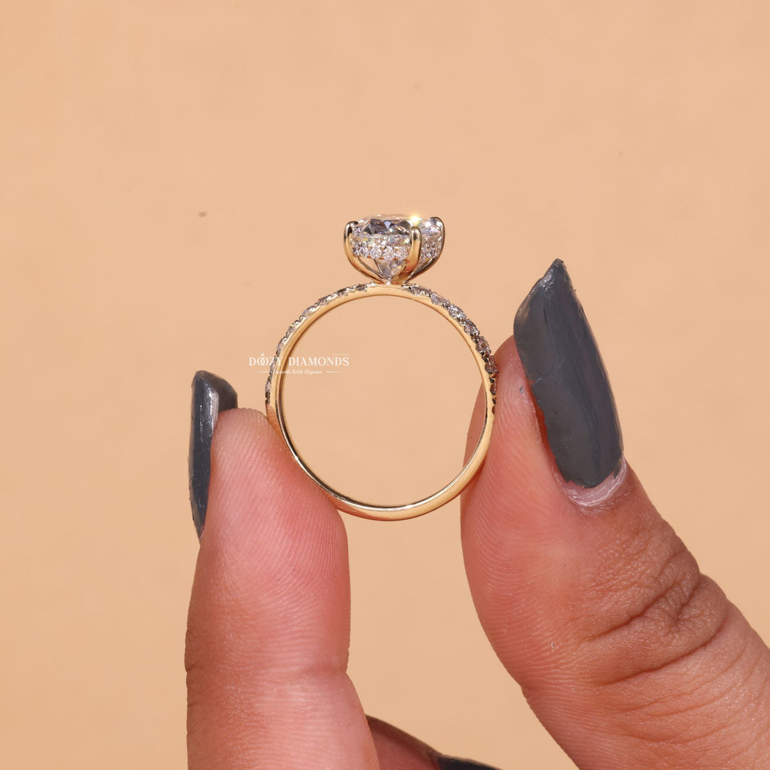 Certified oval cut diamond featured in hidden halo engagement ring