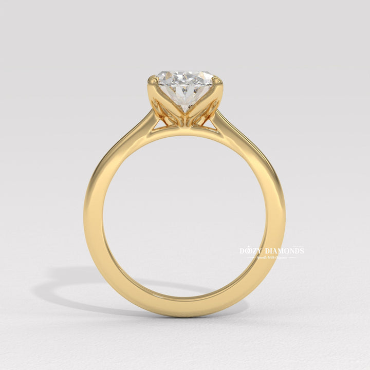 Unboxing view of oval cut solitaire diamond engagement ring