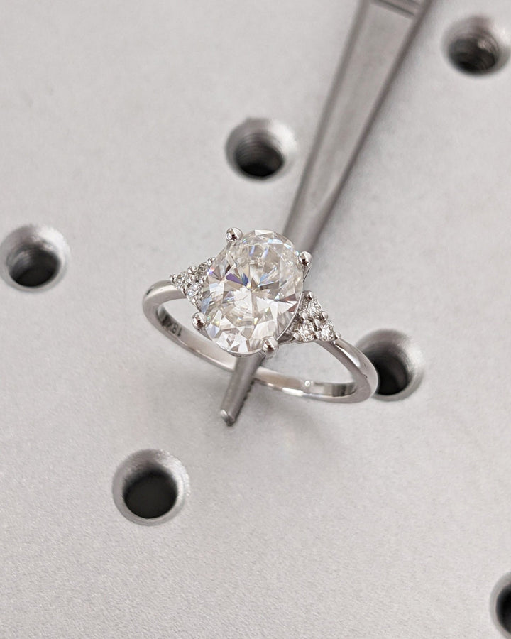Oval cut engagement ring side view showing band detail