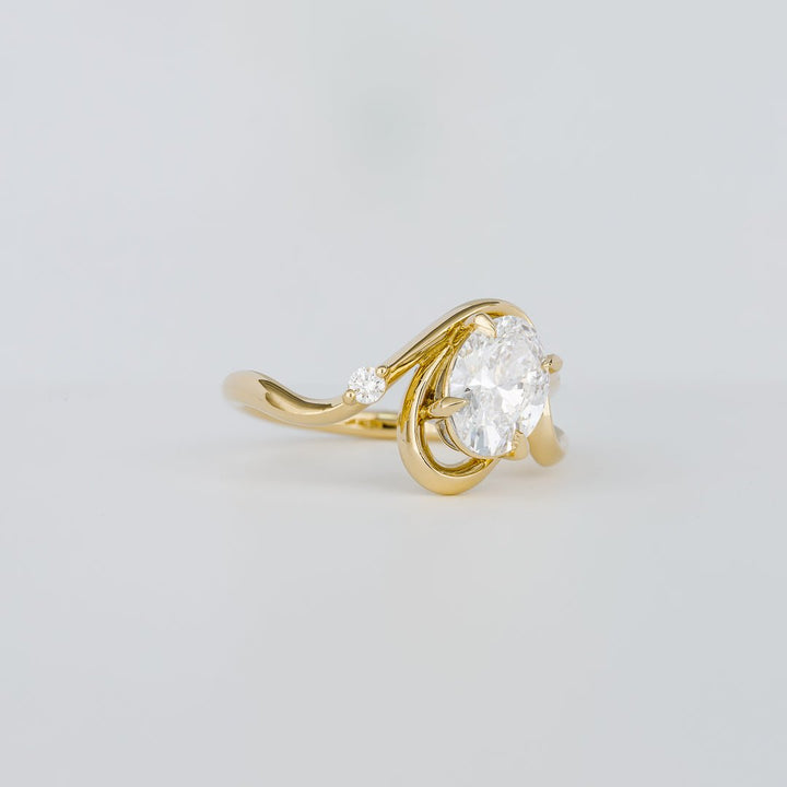 Oval solitaire engagement ring with certified lab grown diamond