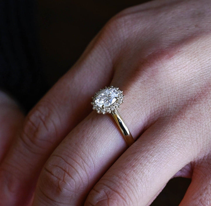 Oval solitaire lab grown diamond ring side profile in gold setting