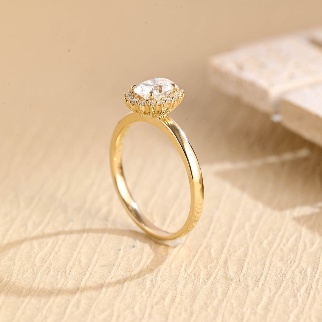 Oval solitaire engagement ring close-up highlighting diamond sparkle