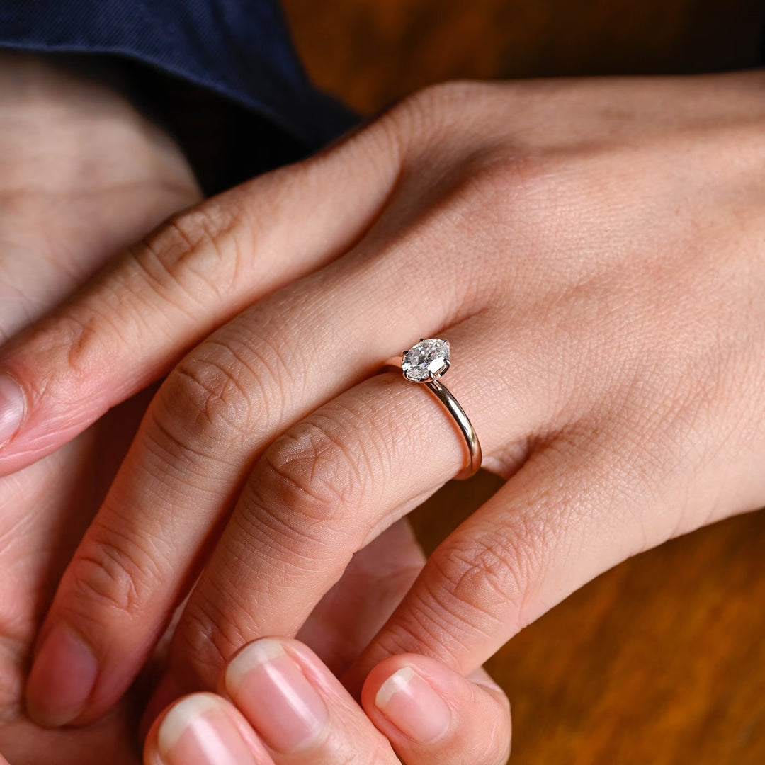 Profile view of oval cut solitaire engagement ring band