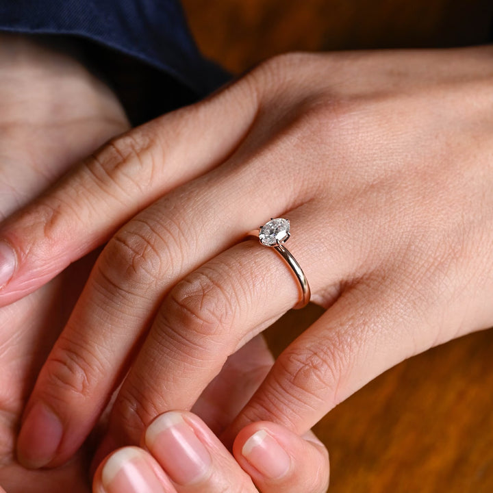 Profile view of oval cut solitaire engagement ring band