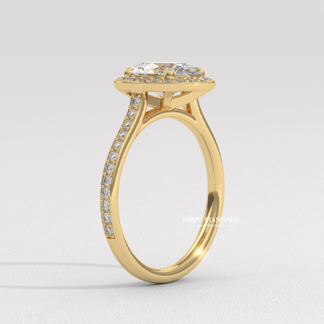 Oval halo lab grown diamond ring fitted on finger