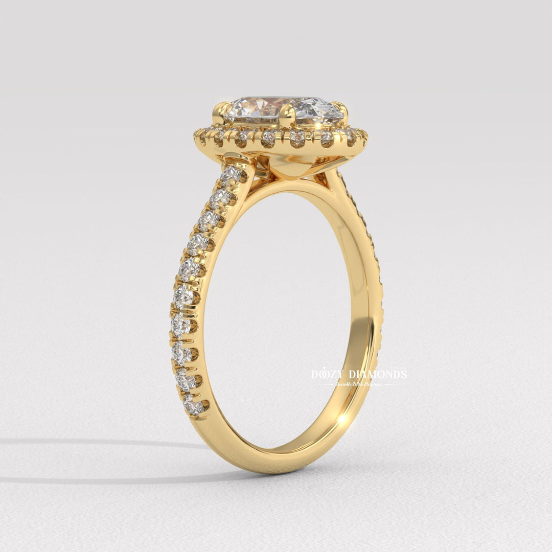 Profile view of oval cut halo engagement ring band