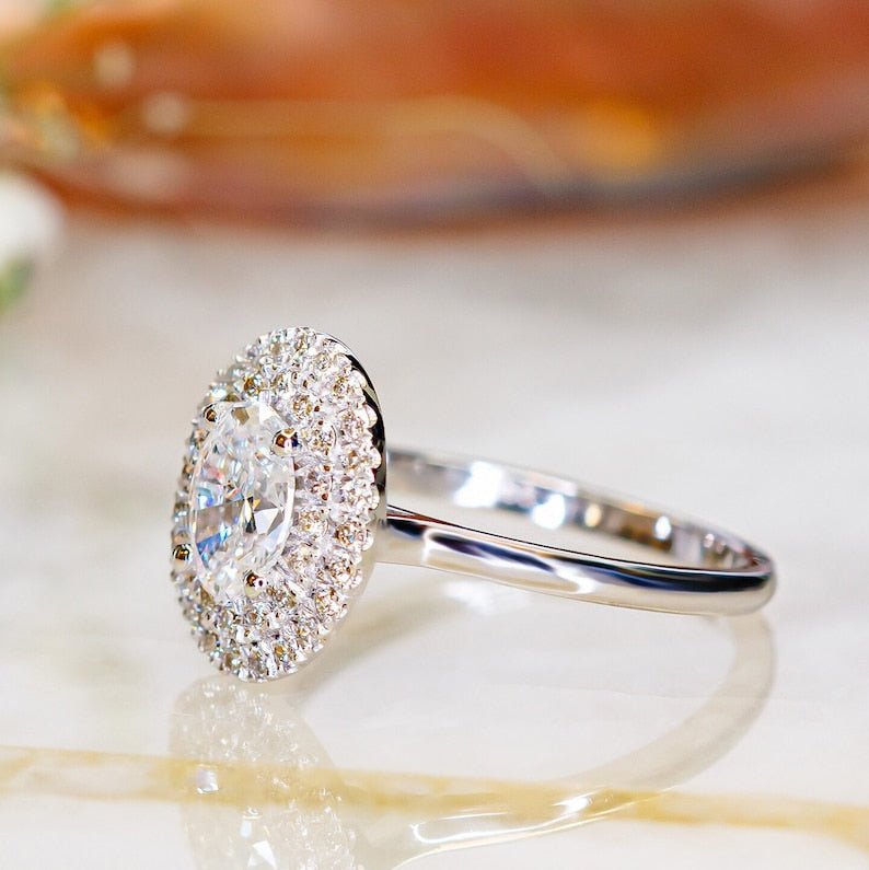 Oval halo lab grown diamond ring side profile in gold setting