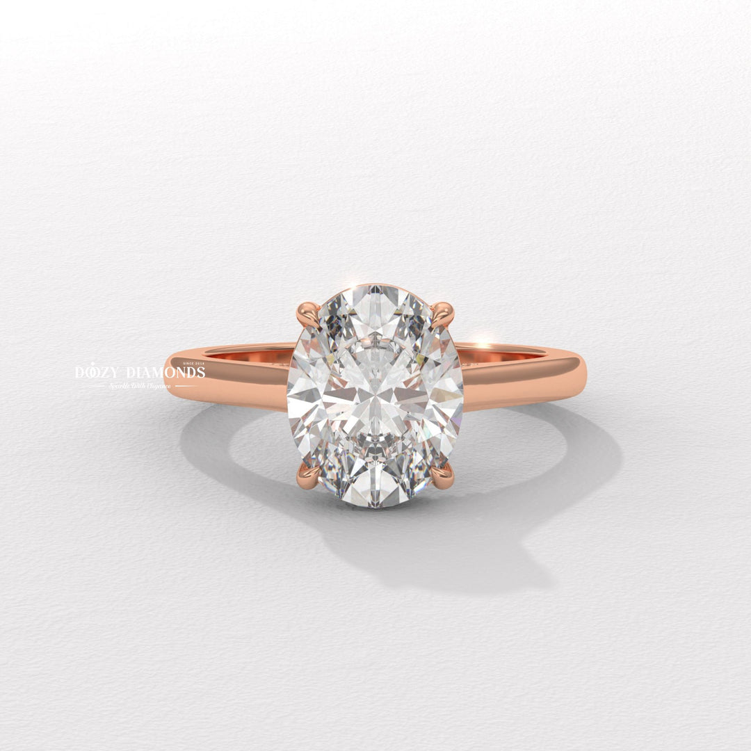 Angled view of oval cut diamond in solitaire setting