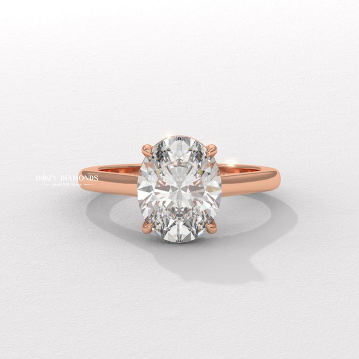 Angled view of oval cut diamond in solitaire setting