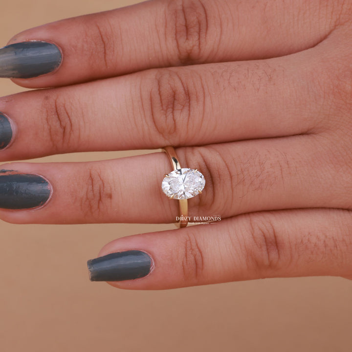 Premium oval cut hidden halo engagement ring crafted in solid gold