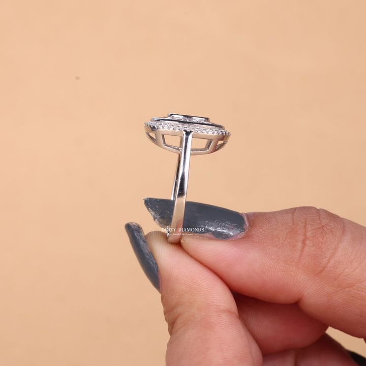 Unboxing view of oval cut cluster diamond engagement ring