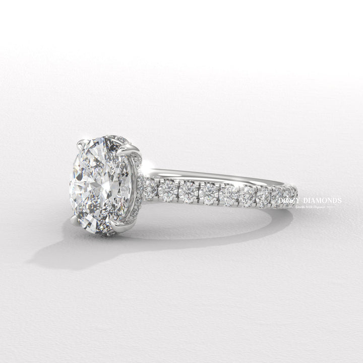 Oval cut engagement ring side view showing band detail