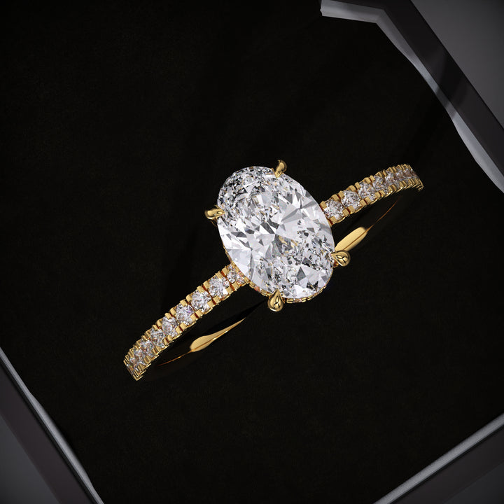 Oval cut hidden halo engagement ring available to buy now