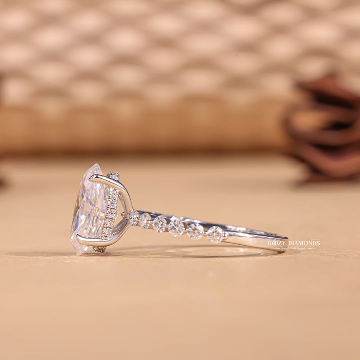 Oval cut engagement ring side view showing band detail