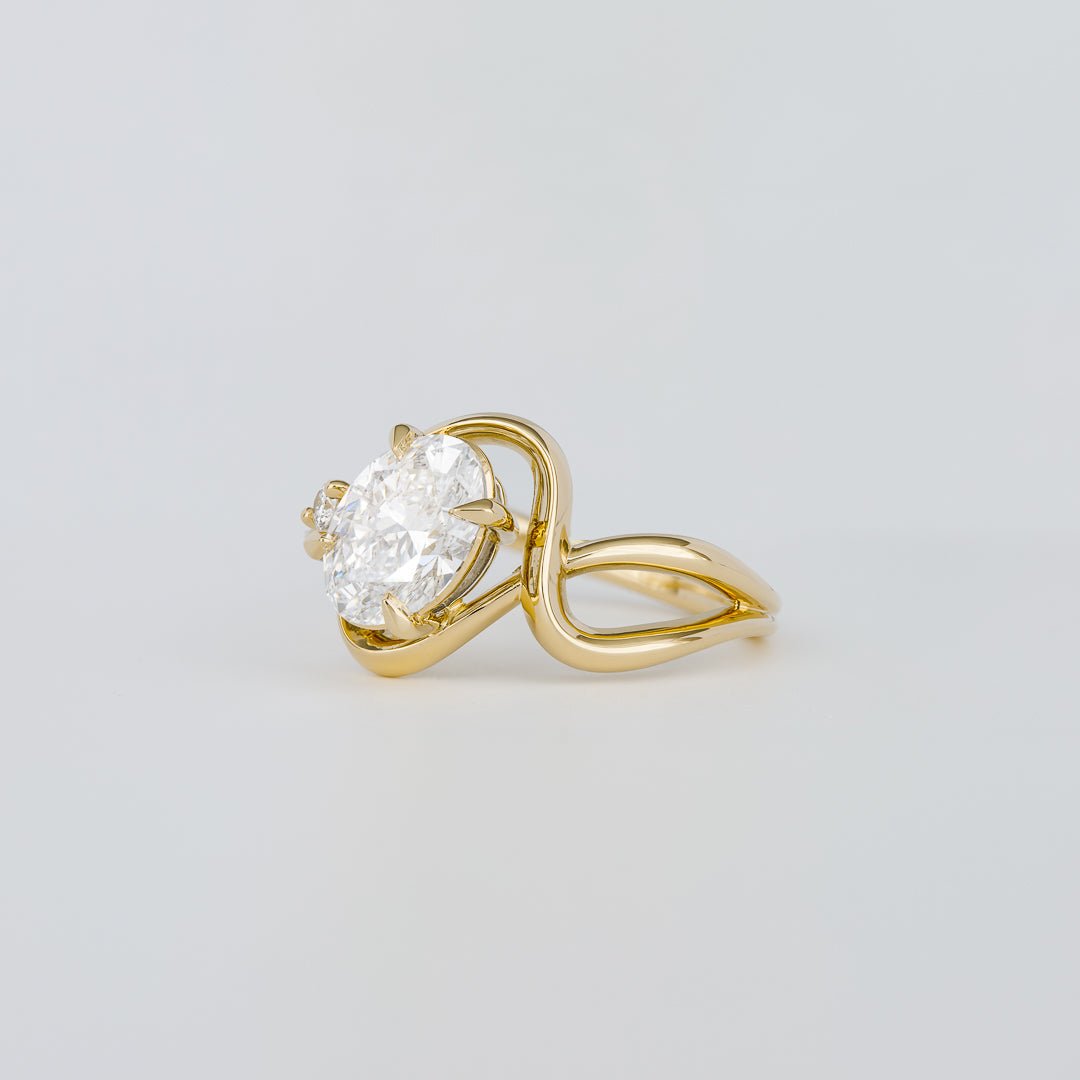 Certified oval cut diamond featured in solitaire engagement ring