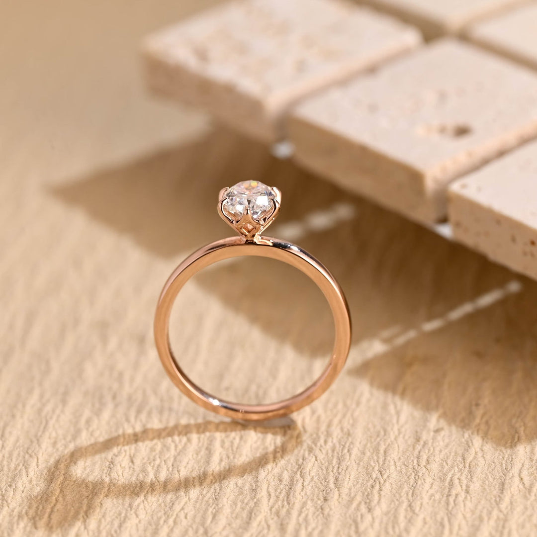 Oval cut engagement ring side view showing band detail