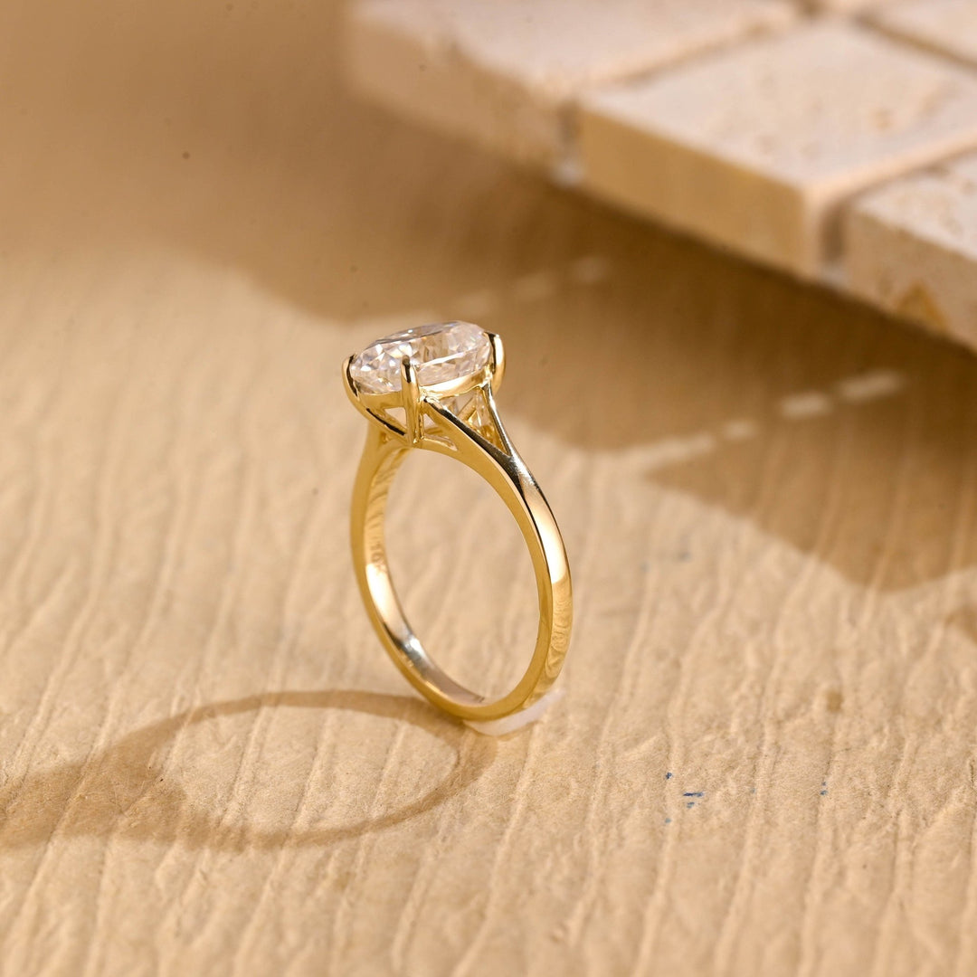 Oval split shank lab grown diamond ring side profile in gold setting