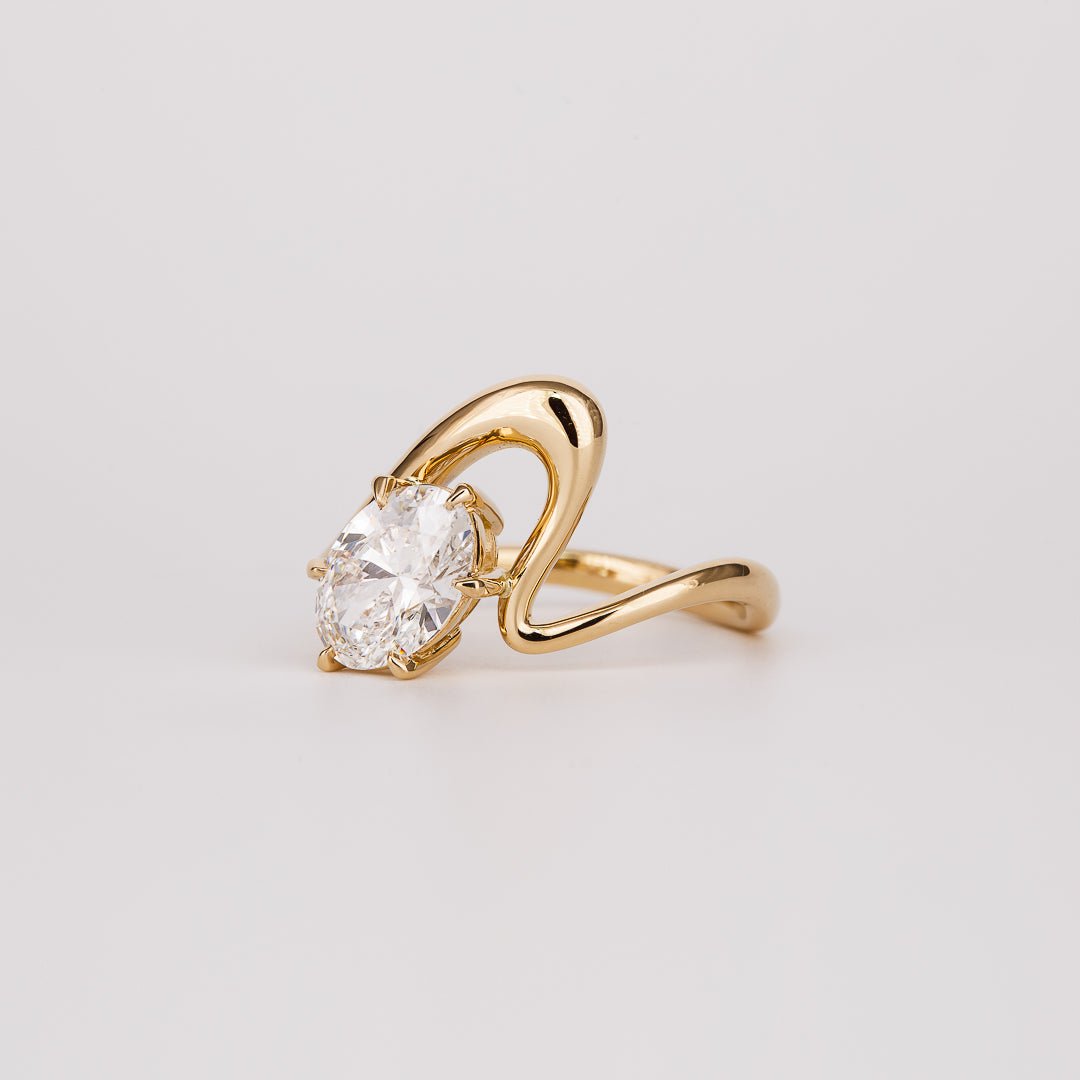 Oval solitaire engagement ring with certified lab grown diamond