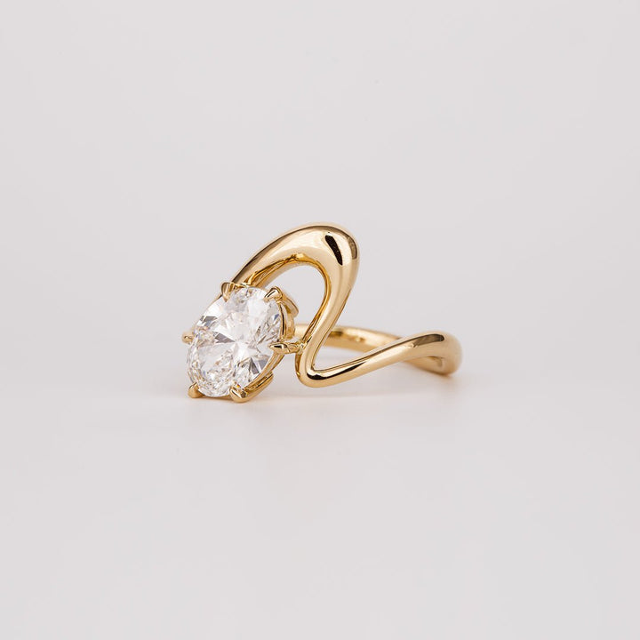 Oval solitaire engagement ring with certified lab grown diamond