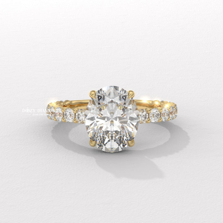 Oval cut pave engagement ring available to buy now