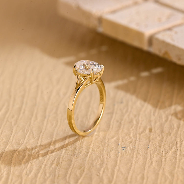 Detailed close-up of oval split shank diamond engagement ring