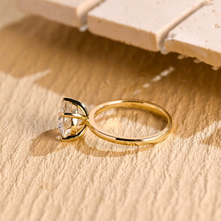 Oval east west engagement ring close-up highlighting diamond sparkle