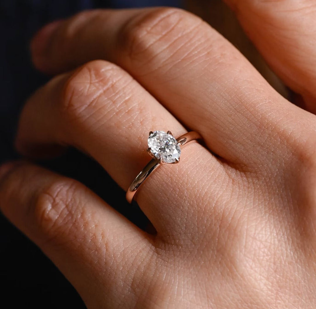 Side angle of oval solitaire diamond engagement ring