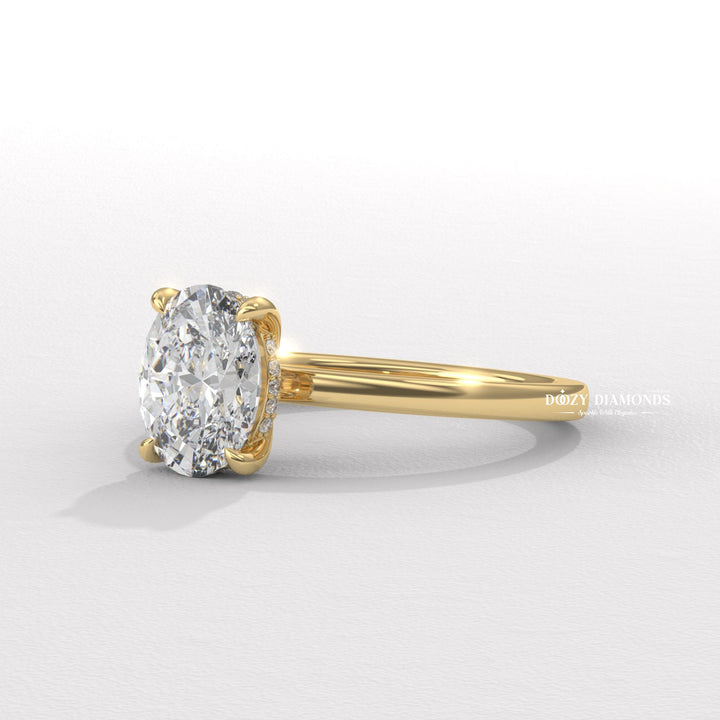 Oval solitaire lab grown diamond ring side profile in gold setting