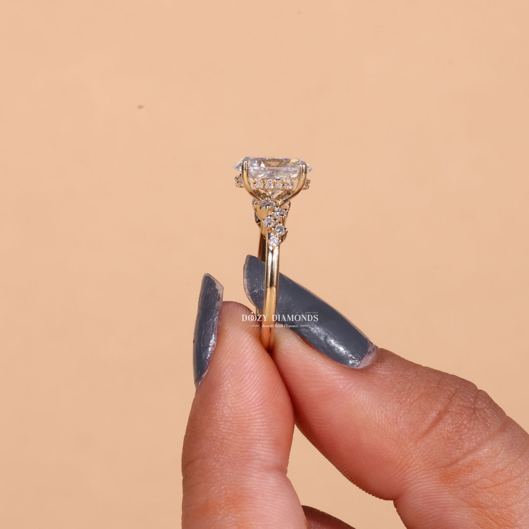 Angled view of oval cut diamond in pave setting