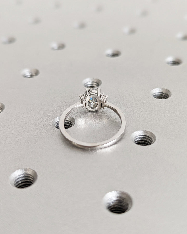 Oval solitaire lab grown diamond ring side profile in gold setting