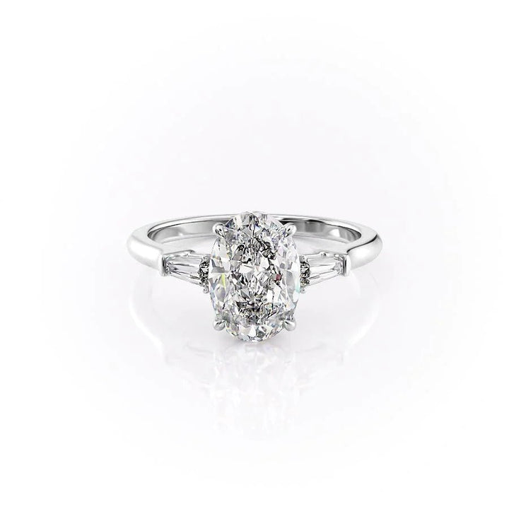 Oval three stone engagement ring photographed in natural light